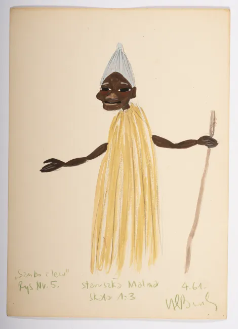 Staruszka Malma - Projekt starszej, ciemnoskórej kobiety w stroju z żółtej rafii. W lewej dłoni trzyma drewnianą laskę.