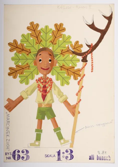 Król lasu - Harcerz II – Projekt uśmiechniętego chłopca w pióropuszu z dębowych liści, czerwonych koralach i harcerskim stroju, trzymający w lewej dłoni laskę zakończoną porożem jelenia.